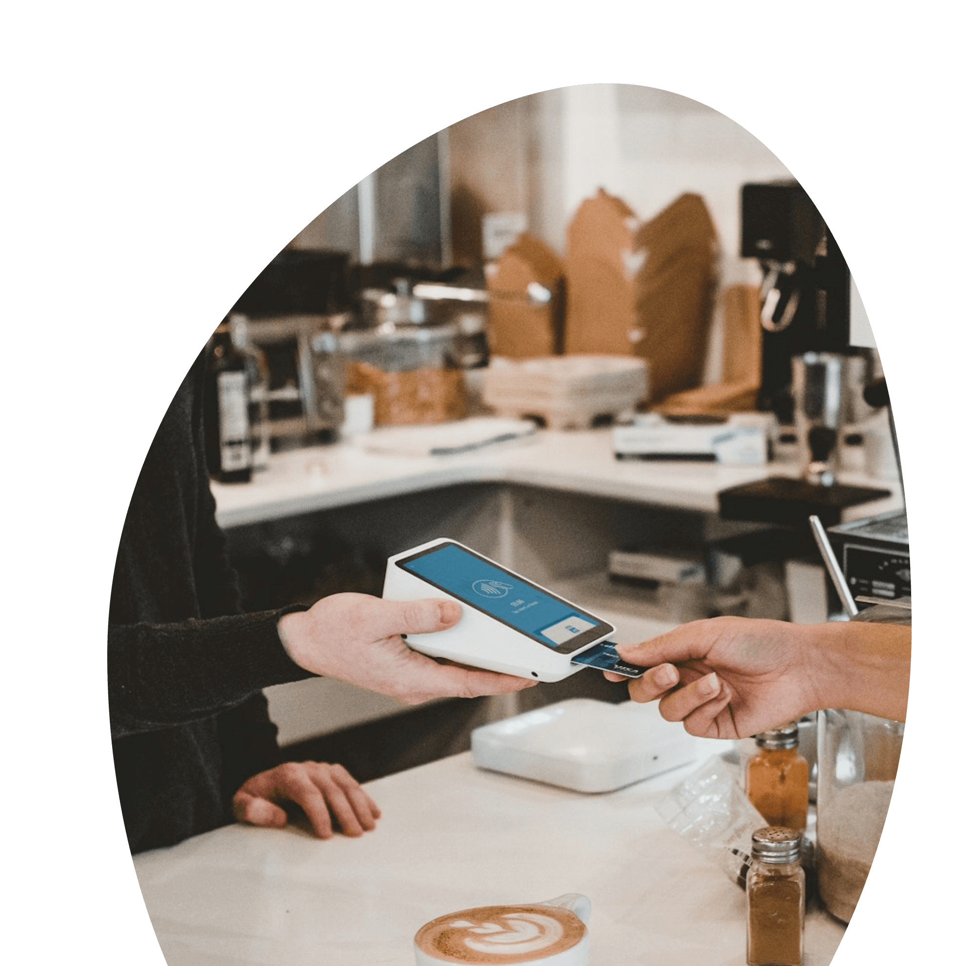 Bobby paying coffee at a cafe suggested by Travous while he was planning his visit to Los Angeles using a credit card.